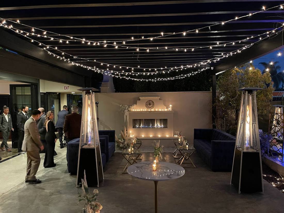 Overhead string lights at a wedding reception